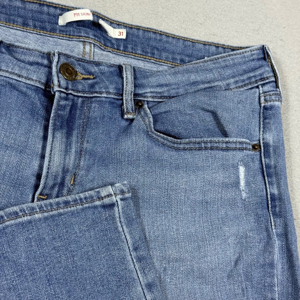 Levis 711 Skinny Jeans Medium Wash Blue Distressed Ripped Denim Womens 31